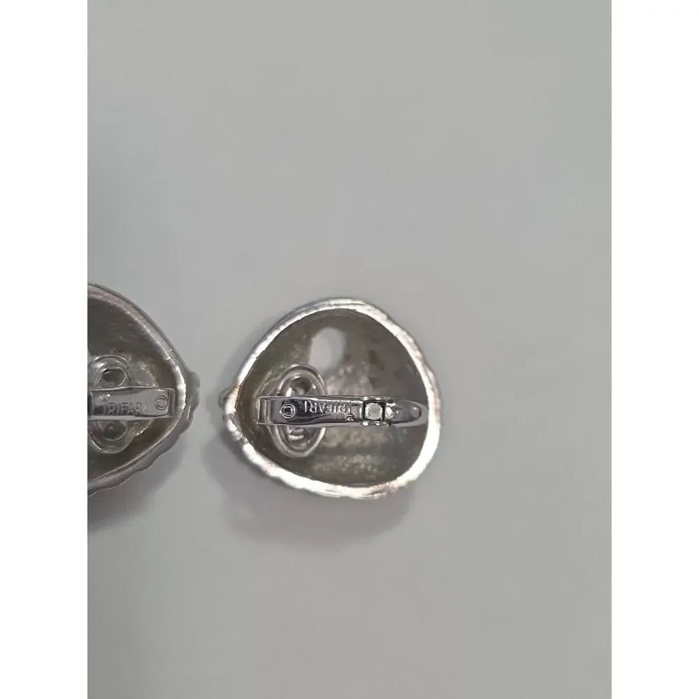 Vintage Crown Trifari Signed Earrings Textured Silver Tone Metal Swirl Clip On